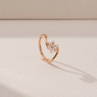 Angled view of Floral Embrace Diamond Ring in 14KT Rose Gold, featuring round lab-grown diamonds in a floral cluster.