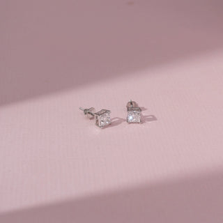Side view of Princess Diamond Stud Earrings in 14KT White Gold, featuring square lab-grown diamonds in sleek settings.