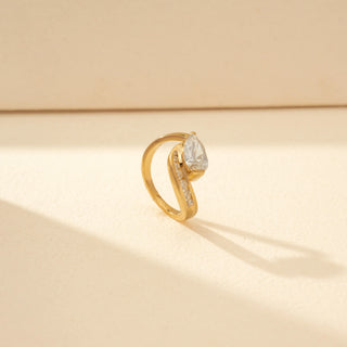 Angled view of Curved Solitaire Diamond Open Ring in 14KT Yellow Gold, featuring a round diamond and pavé curved band.
