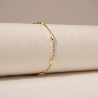 Side view of Luminous Marquise Station Diamond Bracelet in 14KT Yellow Gold, featuring marquise-cut lab-grown diamonds.