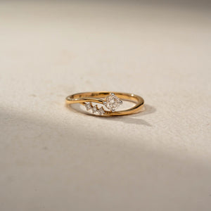 Delicate Solitaire Diamond Twist Ring