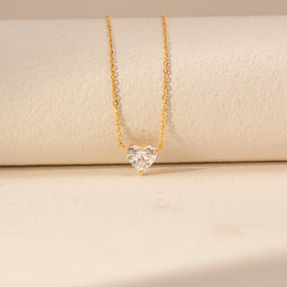 Front view of Round Solitaire Diamond Ring in 14KT Yellow Gold, featuring a round centre diamond and pavé-set band.