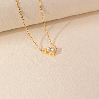 Side view of Round Solitaire Diamond Ring in 14KT Yellow Gold, featuring a round centre diamond and pavé-set band.