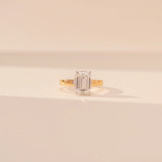 Front view of Contemporary Emerald Sparkle Diamond Ring in 14KT Yellow Gold, featuring an emerald-cut lab-grown diamond.