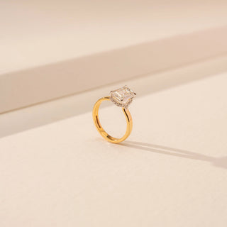 Angled view of Contemporary Emerald Sparkle Diamond Ring in 14KT Yellow Gold, featuring an emerald-cut lab-grown diamond.