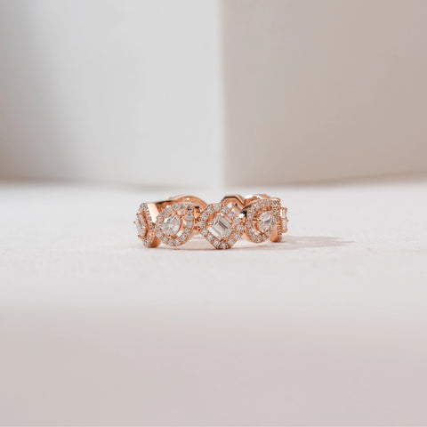 Front view of Geometric Alternating Halo Diamond Ring in 14KT Rose Gold, featuring emerald-cut and round diamonds framed by pavé halos in a continuous alternating pattern across the band.