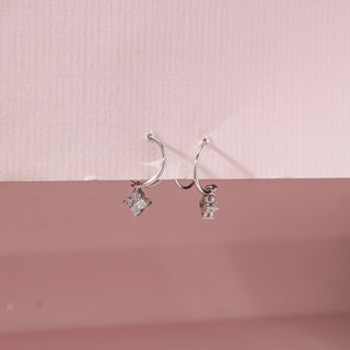 Side view of Floral Loop Diamond Earrings in 14KT White Gold, featuring round lab-grown diamonds in floral clusters.