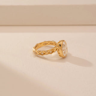 Side view of Vintage Oval Halo Diamond Ring in 14KT Yellow Gold, featuring an oval lab-grown diamond with a halo.