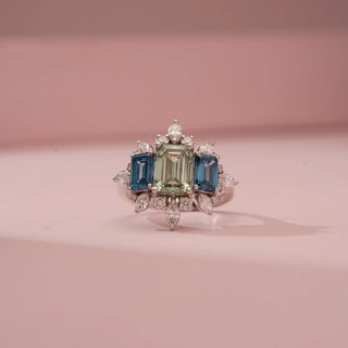 Front view of the Vintage Crown Diamond Cocktail Ring in 14KT White Gold, featuring marquise diamonds, emerald, and sapphire stones for a regal minimalist aesthetic.