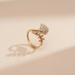 Side view of Reia’s 14 KT Yellow Gold Elegant Statement Branch Diamond Ring. Captured on a cream backdrop, it highlights the architectural fan-like branch motif pavé-set with diamonds.