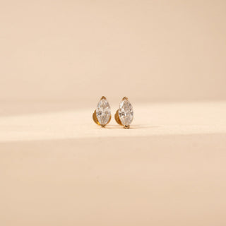 Front view of marquise-cut lab-grown diamond stud earrings in 14 KT white gold, featuring bezel-set marquise-cut solitaire diamonds with intricate open gallery detailing in a timeless elegant design.