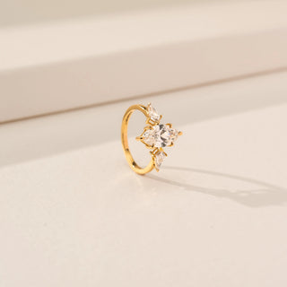 Angled view of Radiant Marquise Motif Diamond Ring in 14KT Yellow Gold, featuring an oval lab-grown diamond and marquise detailing.