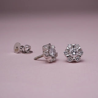 Elegant Flower Diamond Stud Earrings in 14KT White Gold with EF VVS round diamonds, featuring a radiant floral cluster design, symbolising timeless elegance and everyday sophistication.