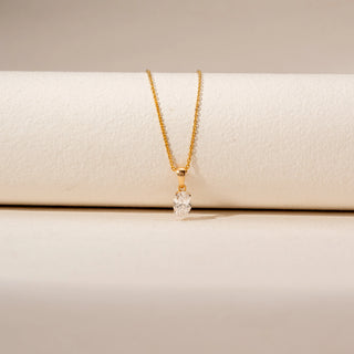 Close-up view of Oval Cut Diamond Pendant in 14KT Yellow Gold, featuring a solitaire lab-grown diamond in a classic setting.