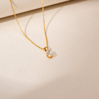 Top view of Oval Cut Diamond Pendant in 14KT Yellow Gold, featuring a solitaire lab-grown diamond in a bezel setting.