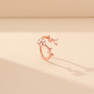 Angled view of Floral Vine Diamond Ring in 14KT Rose Gold, featuring clustered floral blooms and delicate diamond-accented vine details.