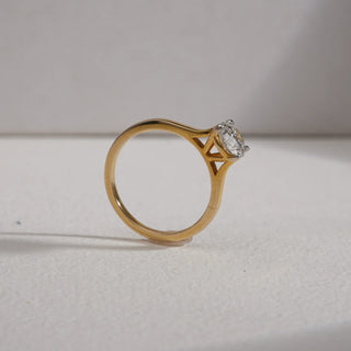 Side view of 14KT Yellow Gold Eternal Promise Solitaire Diamond Ring showcasing a 1 CT EF VVS round diamond in a four-prong setting, crafted for timeless brilliance and elegant simplicity.