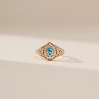 Front view of Radiant Blue Pear Halo Diamond Ring in 14KT Yellow Gold, featuring a blue pear lab-grown diamond with a halo.