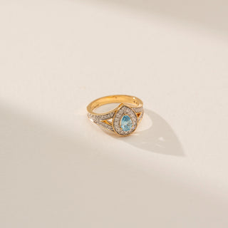 Top view of Radiant Blue Pear Halo Diamond Ring in 14KT Yellow Gold, featuring a blue pear lab-grown diamond with a halo.