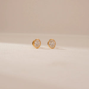 Elegant Oval Bezel Diamond Earrings
