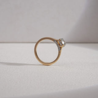 Side profile of Antique Solitaire Gold Diamond Ring in yellow gold, showcasing the raised prong setting and elegant diamond lift. Crafted in 14KT hallmarked gold, the solitaire weighs 0.73 carats with a total diamond weight of 0.86 carats. Excellent cut EF colour VVS clarity diamond, product size 12, weight 2.89 grams.