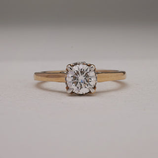 Front view of Antique Solitaire Gold Diamond Ring, highlighting its brilliant 0.73-carat solitaire diamond prong-set in 14KT yellow gold. Diamonds are EF colour, VVS clarity with a total weight of 0.86 carats. Size 12, product weight 2.89 grams, priced between INR 50,000 to 1,00,000.