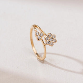 Angled view of Dual Floral Cluster Diamond Ring in 14KT Yellow Gold, featuring a six-diamond flower and a three-diamond bud on a delicate open bypass band.