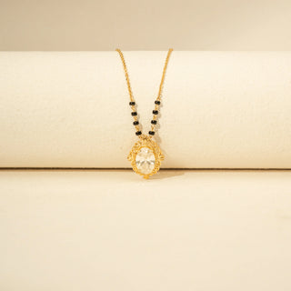 Front view  of Oval Diamond Mangalsutra Pendant in 14KT Yellow Gold, featuring an oval diamond and ornate vintage frame.
