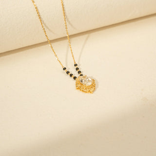 Side view of Oval Diamond Mangalsutra Pendant in 14KT Yellow Gold, featuring an oval diamond and ornate vintage frame.