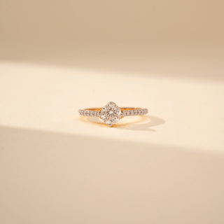 Front view of Elegant Pave Shoulder Diamond Ring in 14KT Yellow Gold, featuring a round-cut lab-grown diamond.
