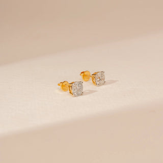 Side view of Pure Round Solitaire Diamond Earrings in 14KT Yellow Gold, featuring round brilliant-cut lab-grown diamonds.