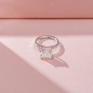Top view of Princess-Cut Solitaire Diamond Ring in 14KT White Gold, featuring a square-cut diamond and pavé-set band.