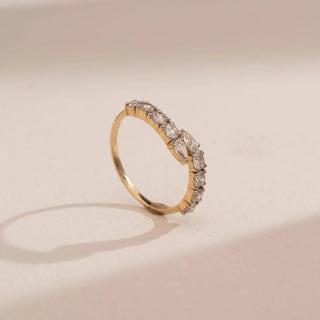 Side view of the Modern Open Diamond Band Ring in 14KT Yellow Gold, featuring pear-shaped diamonds along an open band resembling a contemporary minimalist aesthetic.