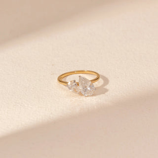 Close up view of Double Pear Diamond Ring in 14KT Yellow Gold, featuring two pear-cut lab-grown diamonds in a sleek setting.