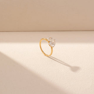 Angled view of Double Pear Diamond Ring in 14KT Yellow Gold, featuring two pear-cut lab-grown diamonds in a sleek setting.
