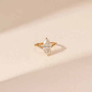 Top view of Marquise Solitaire Diamond Ring in 14KT Yellow Gold, featuring a marquise-cut lab-grown diamond with a curved band.