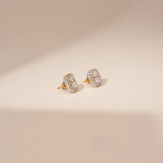 Side view of 14KT Yellow Gold diamond earrings, featuring rectangular step-cut diamonds with a delicate diamond halo.