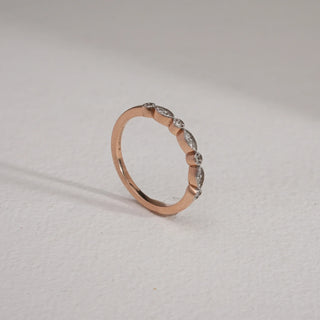 Side view of 14KT Rose Gold Delicate Grace Diamond Eternity Ring with alternating marquise and round EF VVS diamonds, designed for elegant sparkle and perfect stacking luxury.