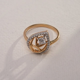 Top view of Teardrop Halo Diamond Ring in 14KT Yellow Gold, featuring EF VVS round diamonds with pavé halo and openwork pear-shaped design, highlighting brilliance and modern elegance.