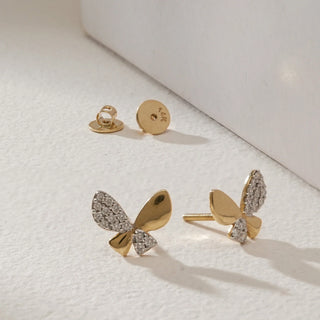 Celestial Butterfly Diamond Studs in 18KT Yellow Gold with EF VVS diamonds totalling 0.23 carats, shown with screw-back closures for secure and elegant wear.
