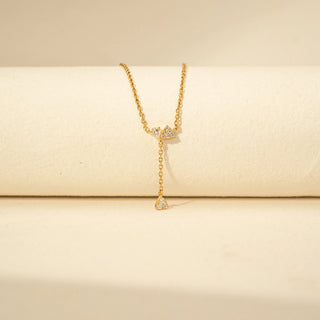Front view of Round Solitaire Diamond Ring in 14KT Yellow Gold, featuring a round centre diamond and pavé-set band.