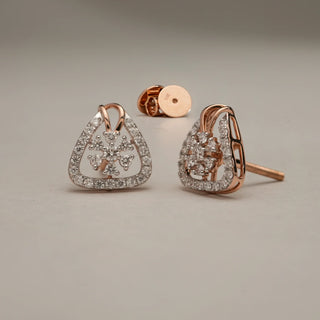 Front view of Layered Spark Triangle Drop Earrings in 14KT Rose Gold, featuring a floral diamond cluster framed by a triangular outline set with EF-VVS lab-grown diamonds and Bombay screw backs.