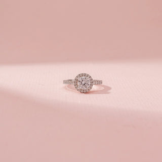 Front view of Halo Solitaire Diamond Ring in 14KT Dual Gold, featuring a round centre diamond surrounded by a pavé diamond halo.
