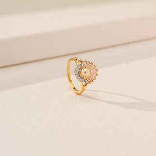 Angled view of Majestic Pearl Crest Diamond Ring in 14KT Yellow Gold, featuring a pearl centre and fan-like diamond detailing.