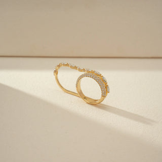 Angled view of Diamond Ring Stack in 14KT Yellow Gold, featuring a pavé band and a marquise diamond-accented band.