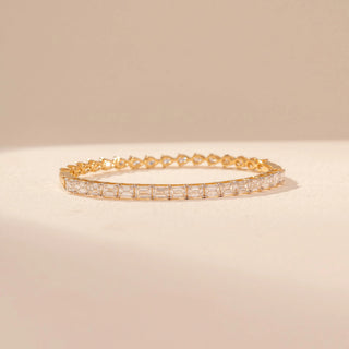 Front view of Round Solitaire Diamond Ring in 14KT Yellow Gold, featuring a round centre diamond and pavé-set band.