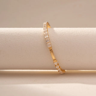 Close up view of Round Solitaire Diamond Ring in 14KT Yellow Gold, featuring a round centre diamond and pavé-set band.