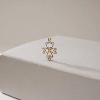 The Petal Diamond Pendant in 14KT Yellow Gold, featuring EF VVS diamonds totalling 0.539 carats, is crafted in a floral petal design that sparkles with elegance and timeless charm.