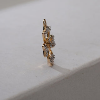 Side view of the Petal Diamond Pendant in 14KT Yellow Gold, showcasing EF VVS diamonds totalling 0.539 carats, with intricate floral petals designed for elegance and timeless allure.