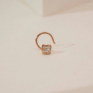 Front view of floral cluster lab-grown diamond nosepin in yellow gold, featuring four round diamonds arranged in a delicate flower motif with a minimal elegant finish.
